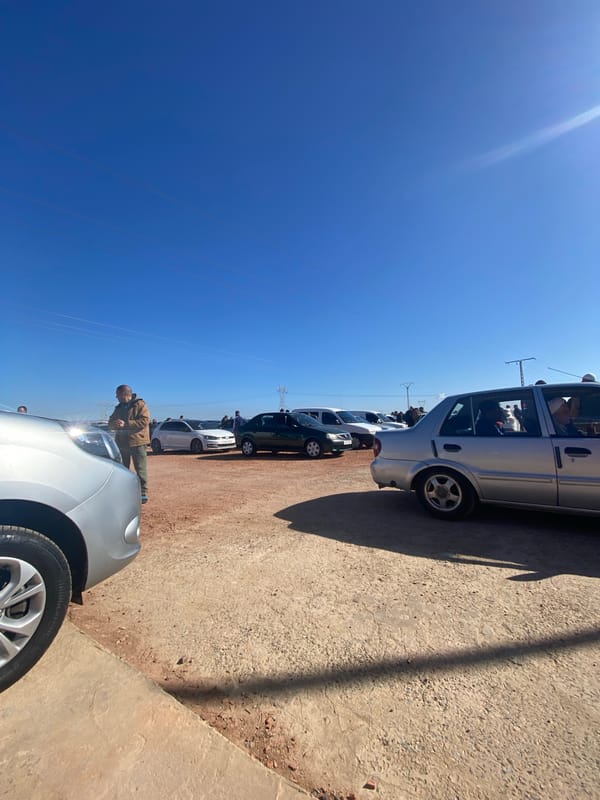Car market gathering draws crowd in Ben Freha, Algeria