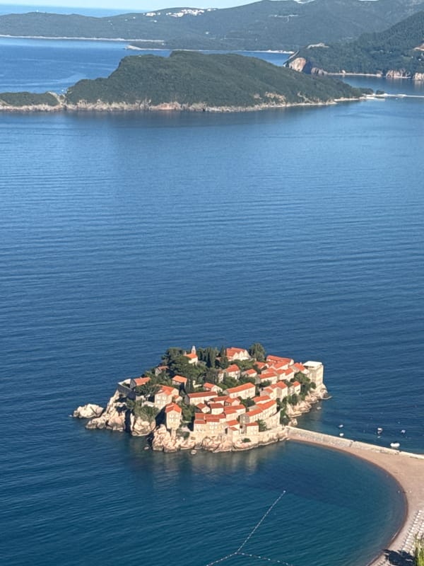Aerial view captures Sveti Stefan luxury resort island Montenegro