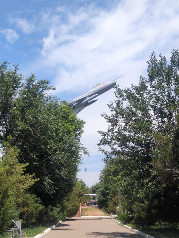 Morning documentation of Shymkent landmarks includes jet monument, circus