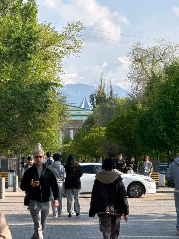 Sunny day captured on decorated pedestrian boulevard in Almaty
