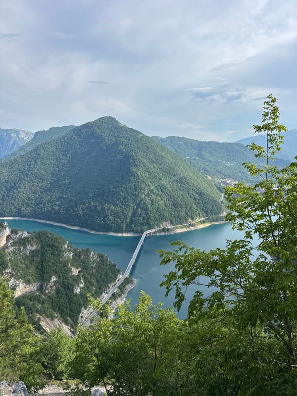Alpine roads, lakes, and mountain views on a June afternoon