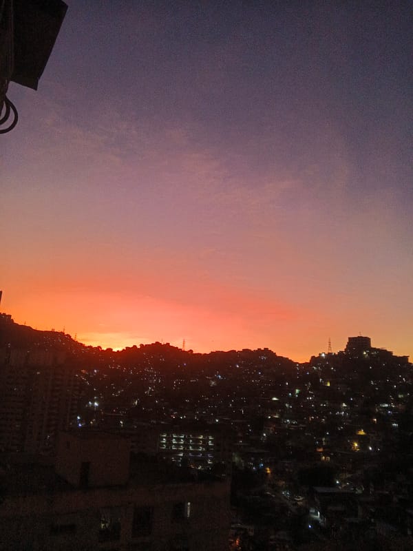 Caracas residents capture sunset transition across Venezuelan capital's skyline