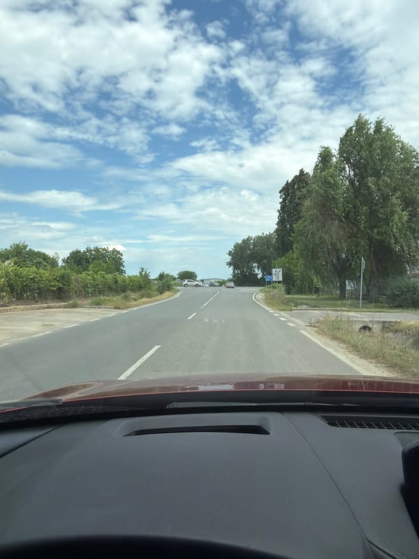 Vehicle travels two-lane road in Orizari, Bulgaria
