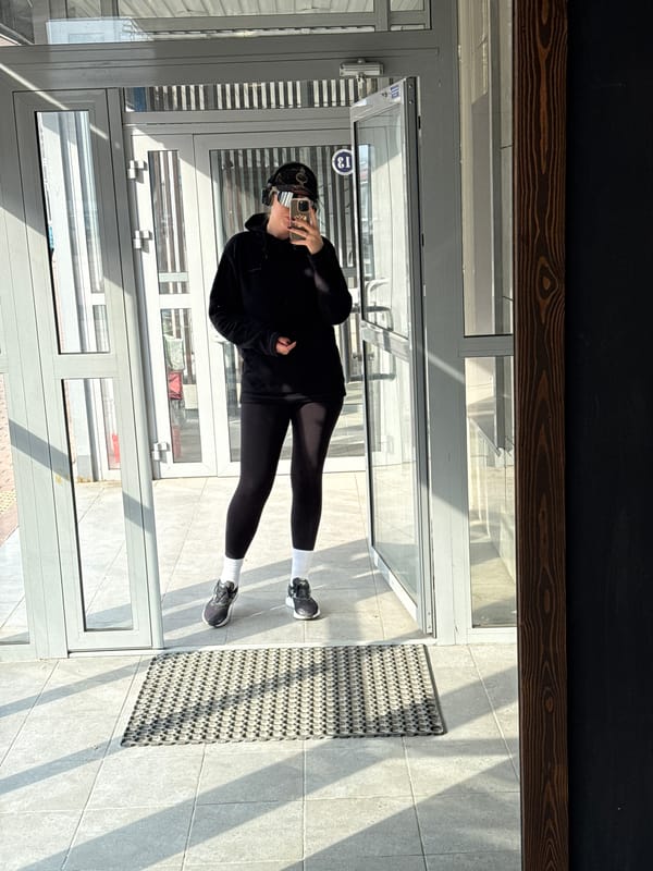 Person in athletic wear spotted in Krasnoyarsk doorway