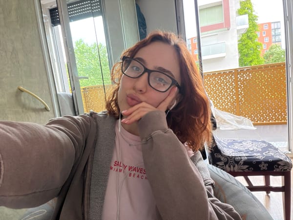 Young woman takes selfies in Strasbourg apartment