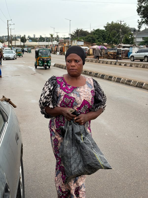Wet morning street life across Jos, Nigeria