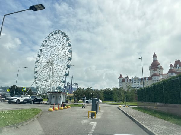 Morning views of Ferris wheel and stadium in Sirius, Russia