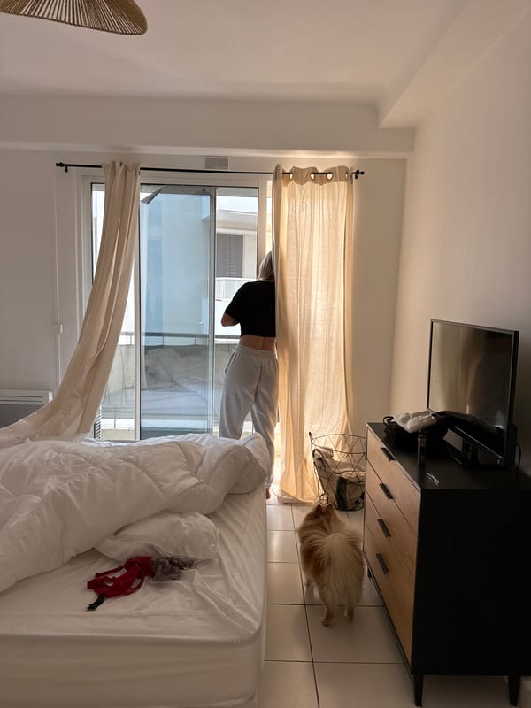 Woman spotted in disheveled bedroom through open window in Cannes