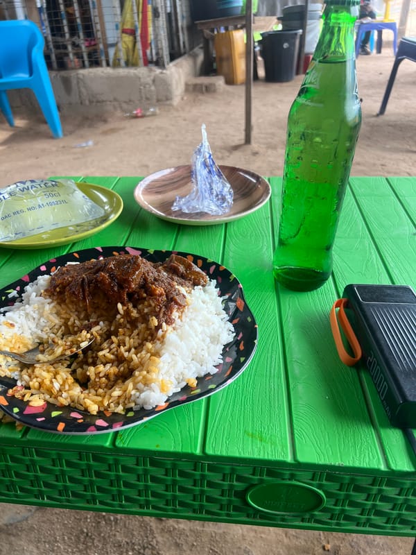 Outdoor meal documented in Jalingo, Nigeria midday setting