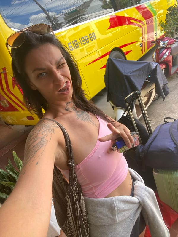 Selfies by a yellow bus and bamboo greenery in Đà Lạt