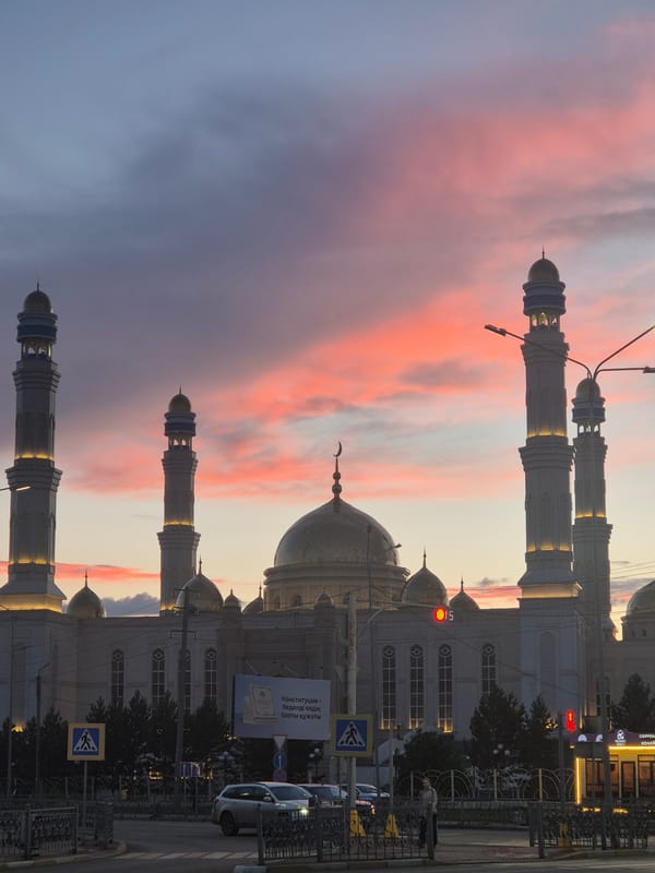 Kokshetau at dusk: mosques glowing and sculptures on the street