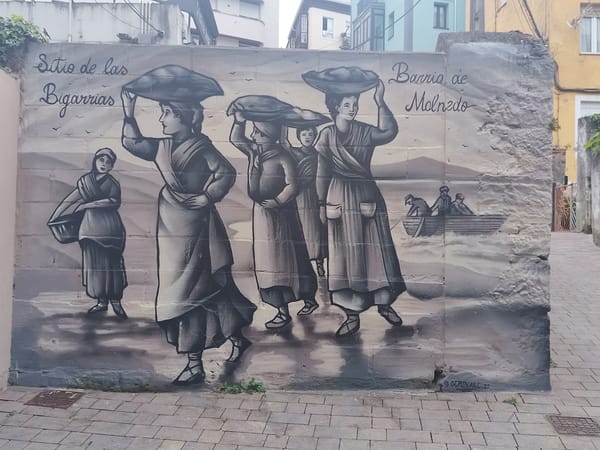 Mural showing women carrying baskets spotted in Santander