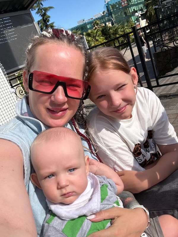 Family outing near Sochi's landmark railway station