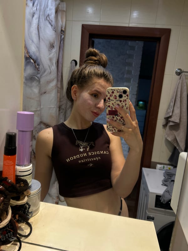 Woman documents morning skincare routine in Klin bathroom selfies