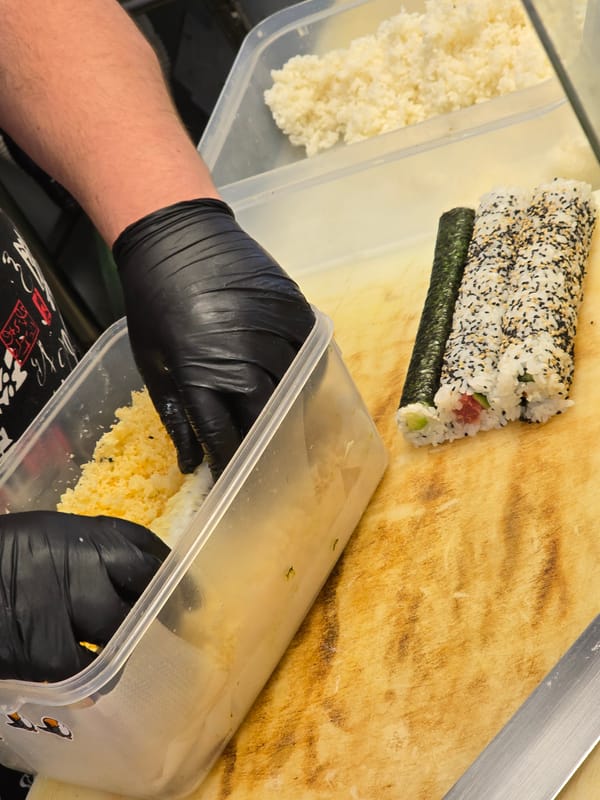 Sushi preparation documented at Burgas restaurant during lunch service
