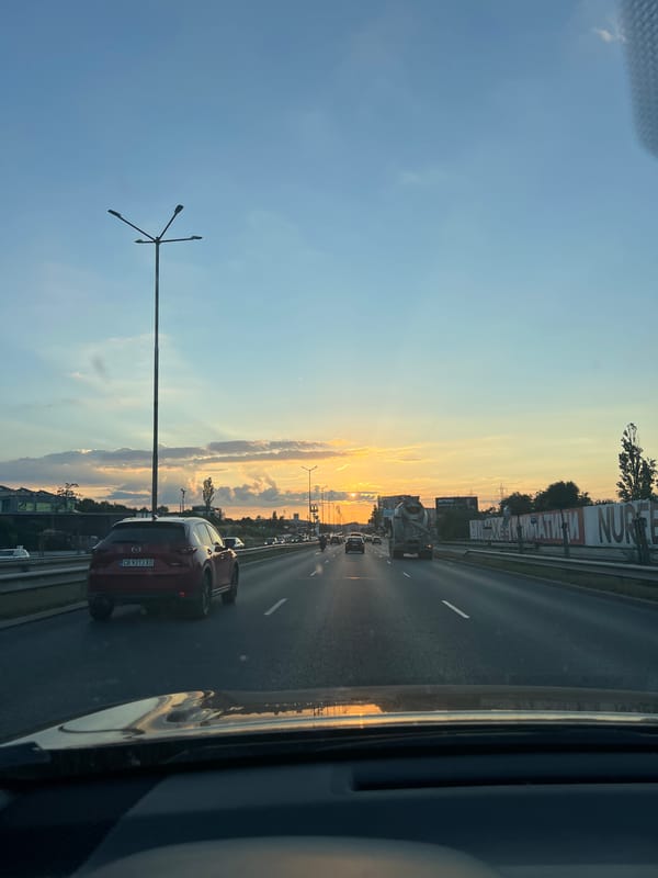 Golden sunset over Sofia highways, seen from the road