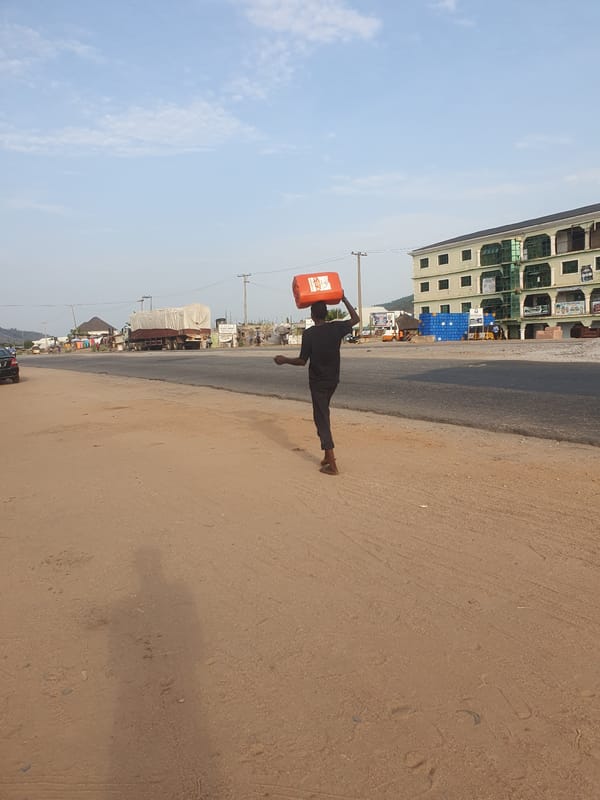Daily life documented on Lokoja streets during afternoon hours