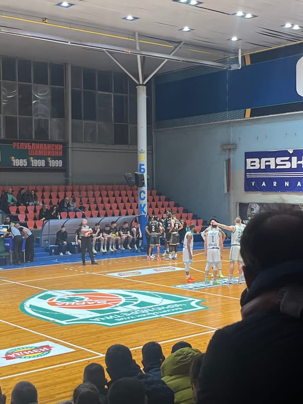 Basketball game underway in Varna gymnasium between two teams
