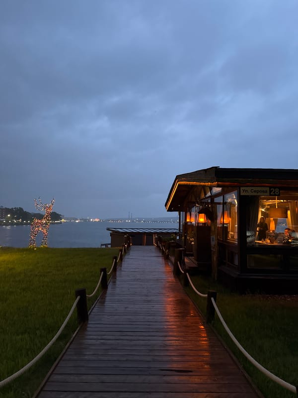 Evening waterfront scenes documented at Votkinsk restaurant terrace area