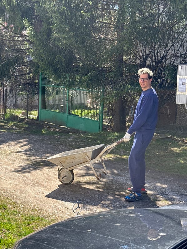 Couple shares romantic moment during yard work in Bulgaria