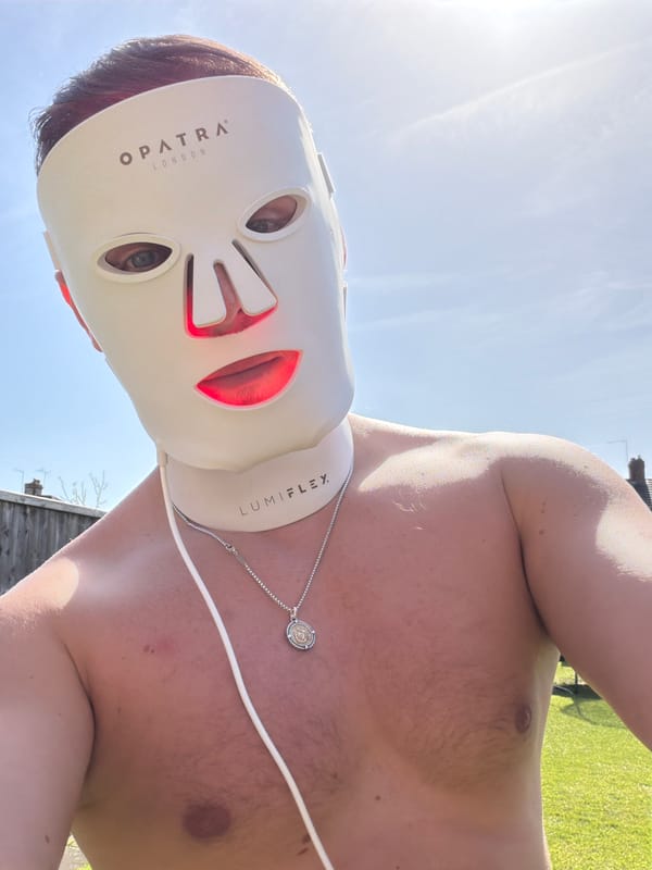 Man Uses LED Light Therapy Mask Outdoors in London
