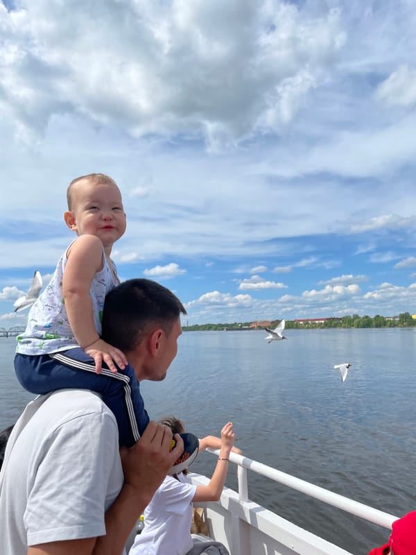 Family enjoys sunny boat ride on Kama River