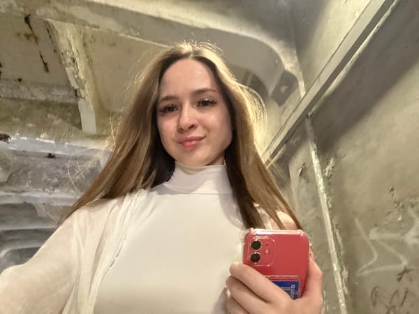 Woman documents urban journey through selfies across city locations