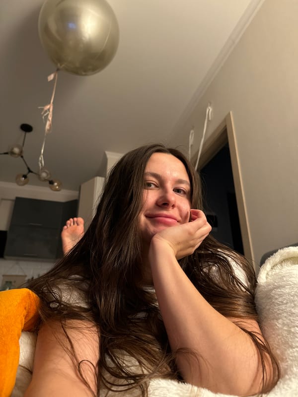 Woman Takes Multiple Selfies During Evening in Odintsovo