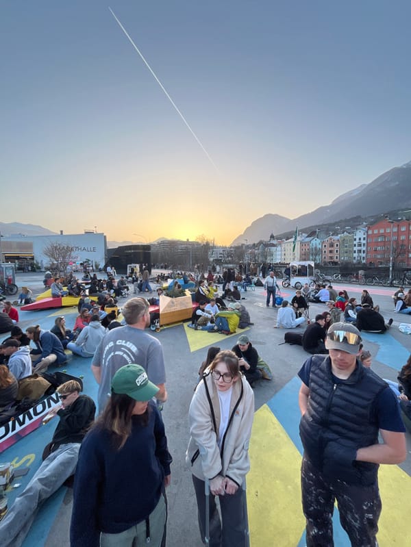 Sunset scene captured at Innsbruck's Inn River plaza