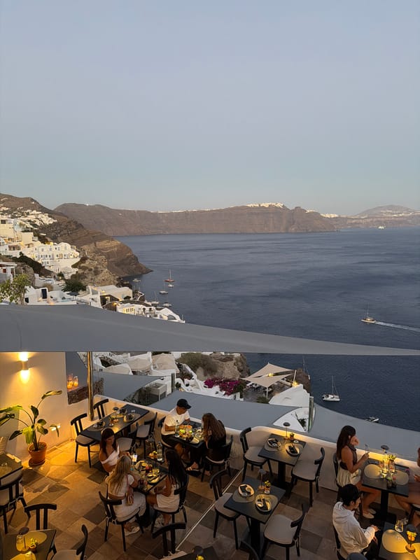 Oia, Santorini glows as dusk fades into night