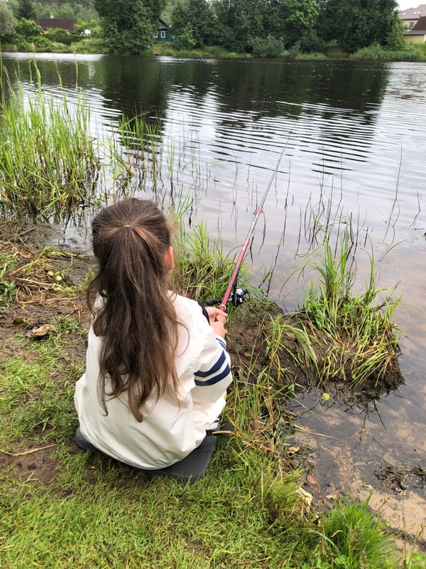 Quiet afternoon fishing on the banks of Bolshiye Polya