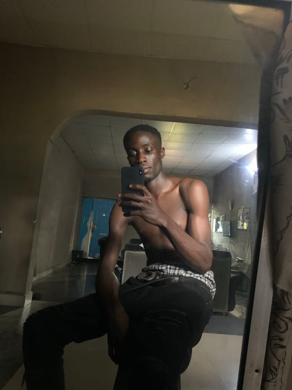Man Takes Selfies in Gbeleko Building