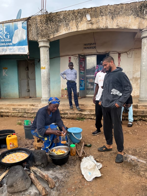Morning street life in a Jos, Nigeria neighborhood