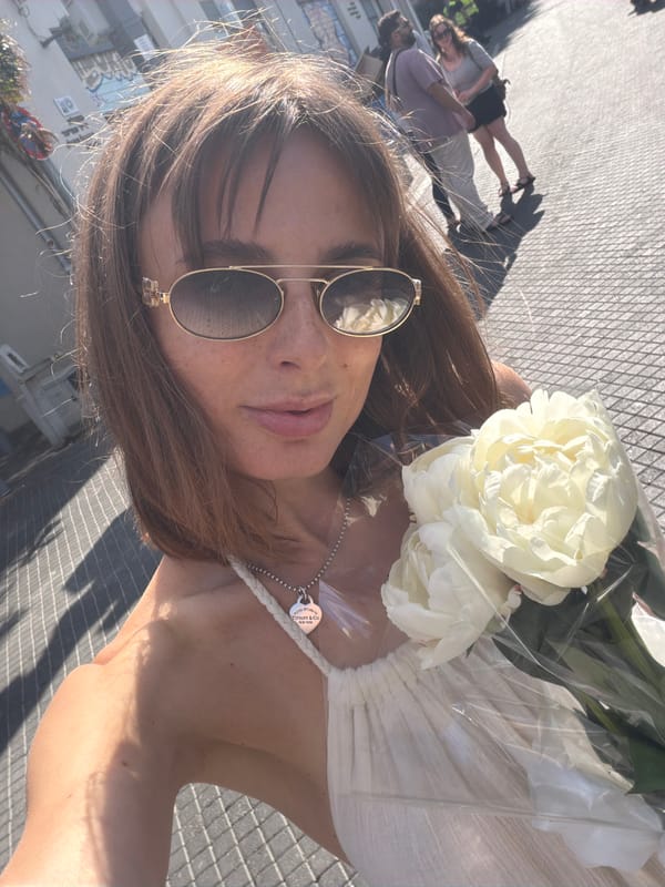Flowers, produce, and a bouquet at a Tel Aviv market