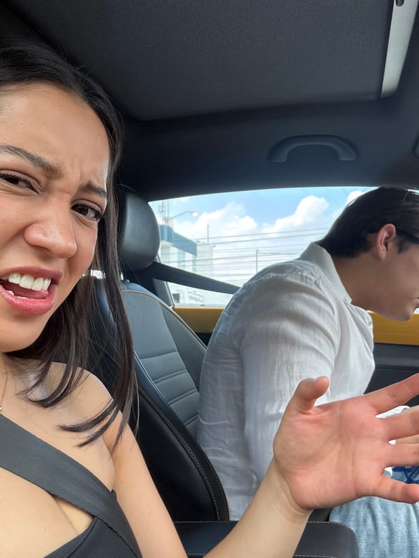 Woman takes car selfies in Puebla, Mexico