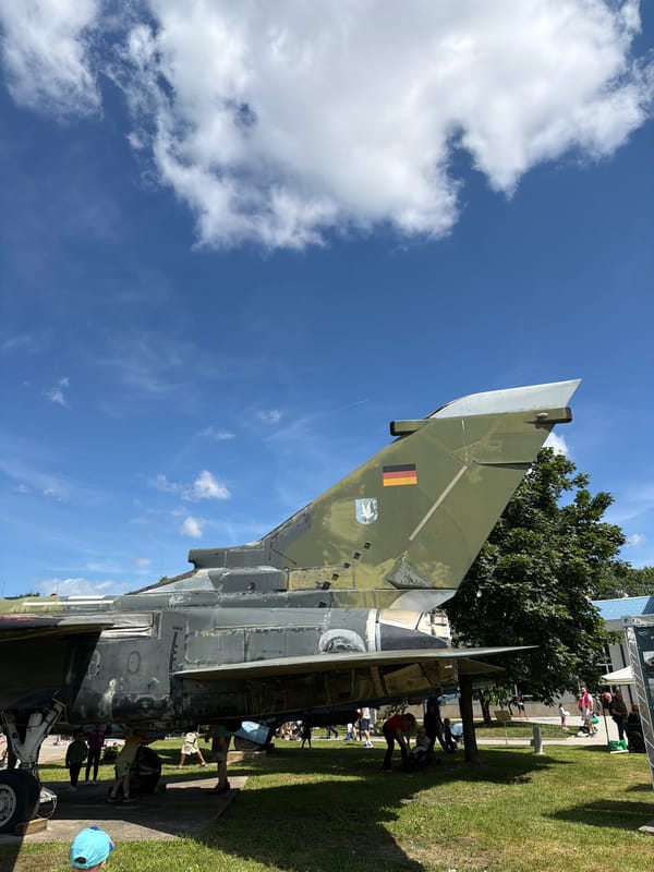 Military aircraft and vehicles displayed outdoors in Sofia