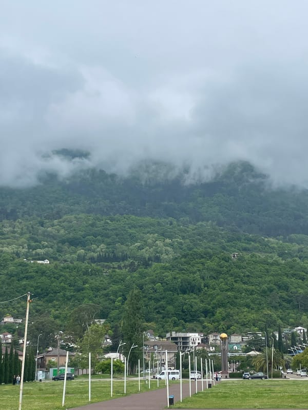 Tourist visits amusement park attractions in Gagra, Abkhazia