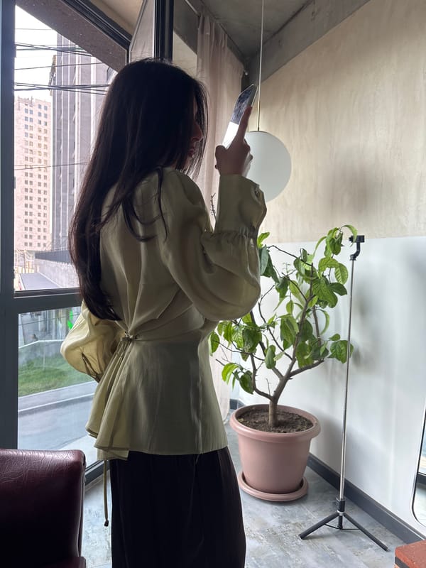Woman documents daily selfie ritual in Yerevan apartment