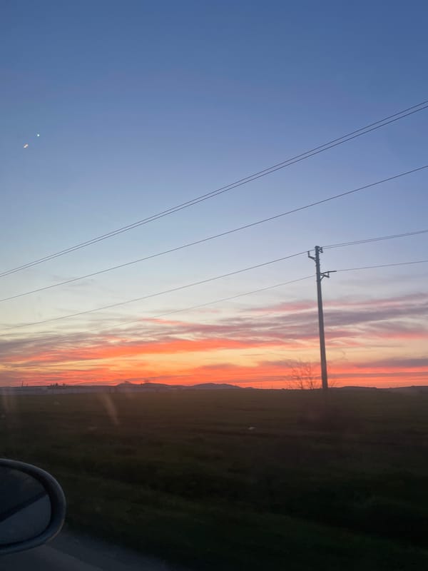 Sunset observed over Ravda, Bulgaria power lines