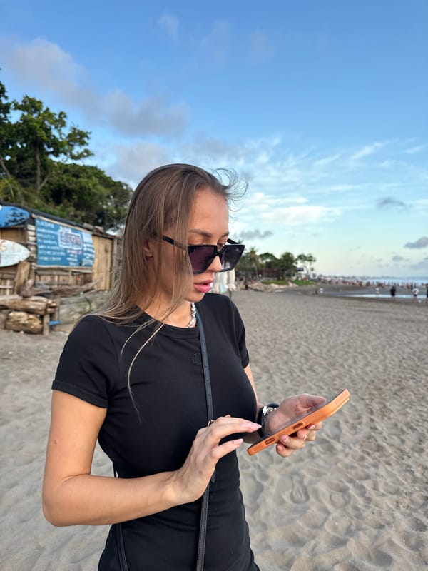 Woman with smartphone spotted on North Kuta beach