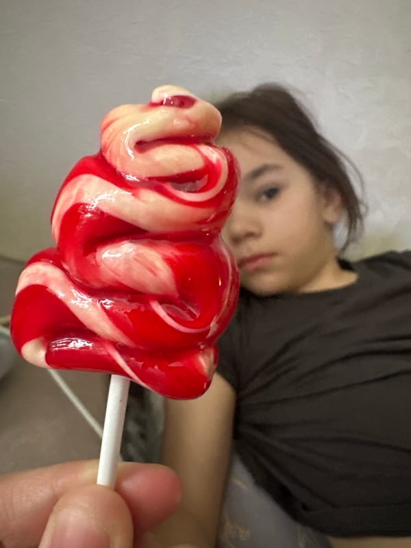 Children photographed with candy during early morning in Uva, Russia