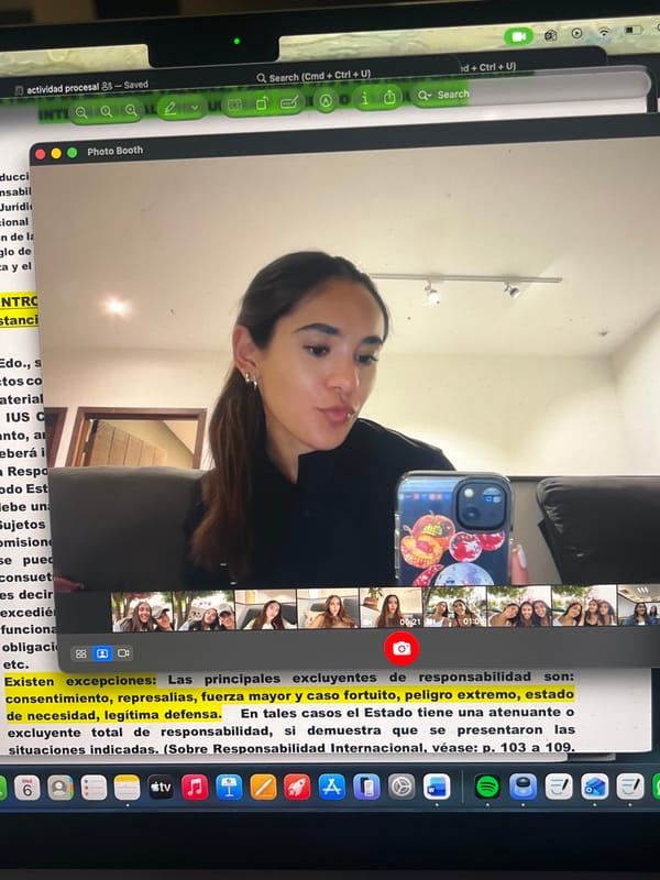 Woman documents digital activities during late-night study session