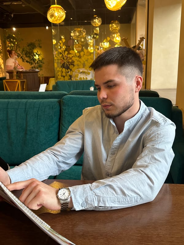 Diners gather at Perm restaurant, examine menus and beverages