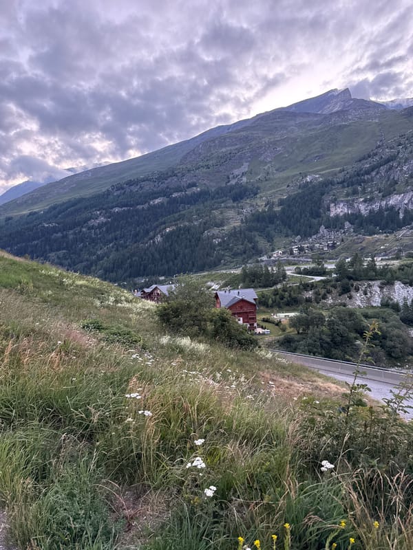 Winding through Tignes past reservoirs and alpine meadows