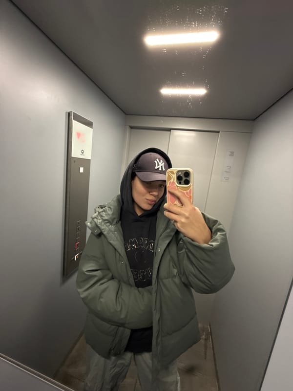 Person takes selfies indoors in Belgrade neighborhood