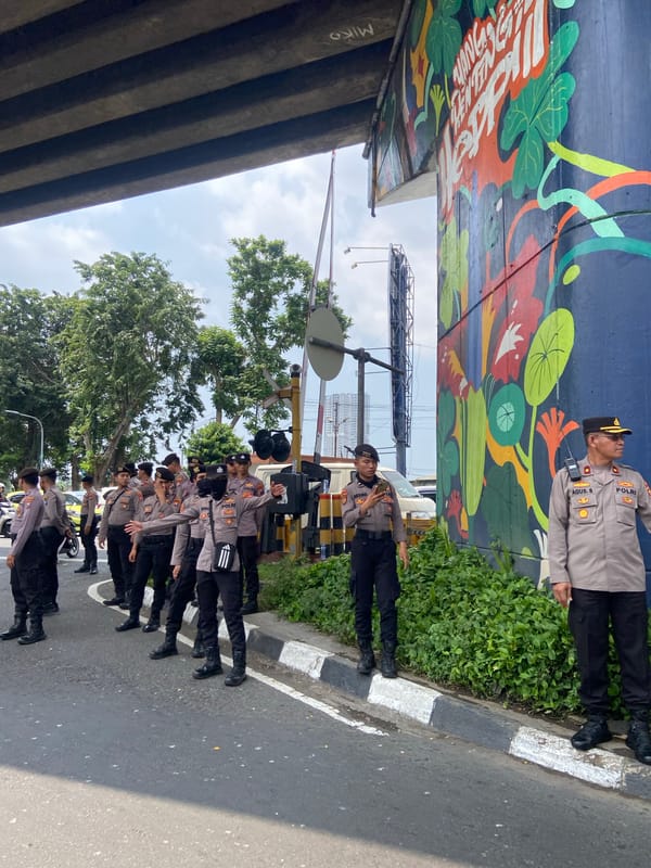 Police officers gather for formal ceremony in Surabaya