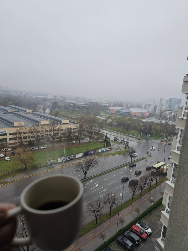 Morning coffee view overlooks busy Plovdiv street from building