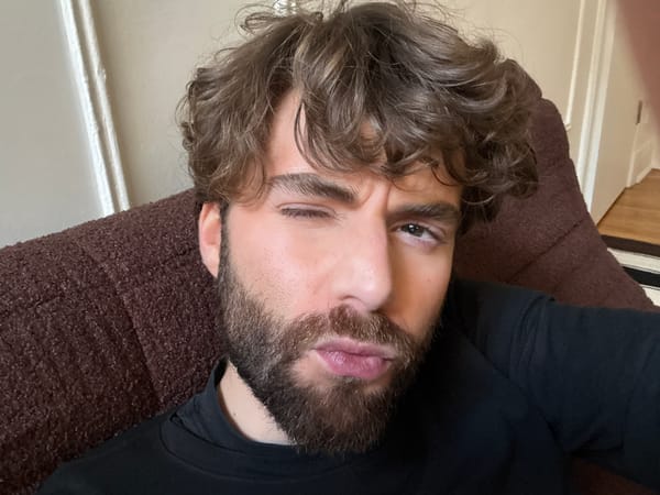 Man rests on couch in Montreal home