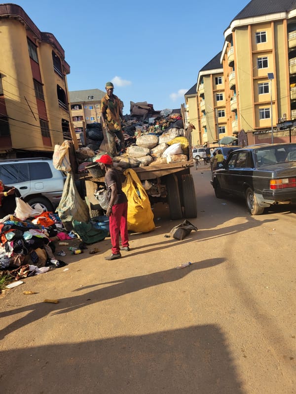 Everyday street life along a busy Onitsha corridor