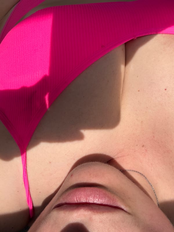 Woman in pink bikini photographed multiple times in Chaikovsky